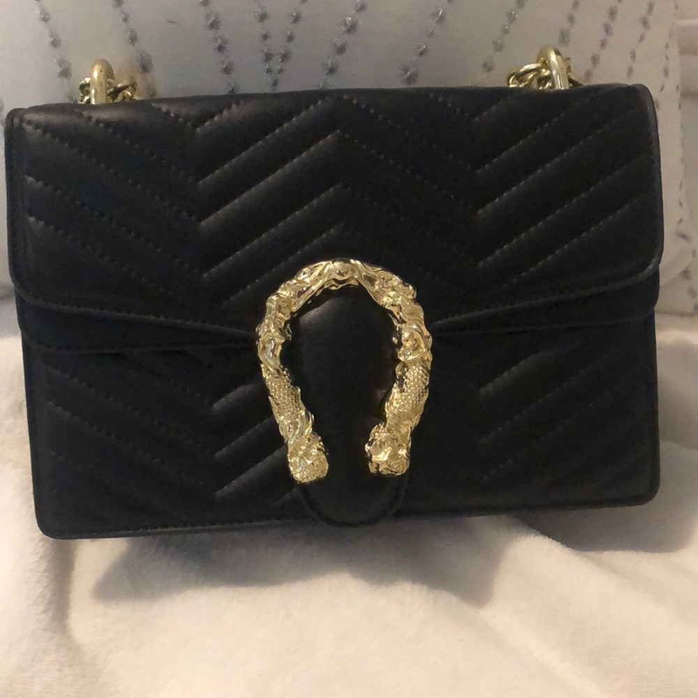 Black purse with chain